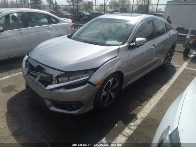 Photo 1 VIN: 19XFC1F93GE004929 - HONDA CIVIC SEDAN 