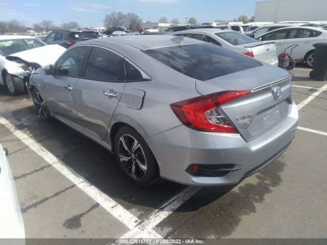 Photo 2 VIN: 19XFC1F93GE004929 - HONDA CIVIC SEDAN 