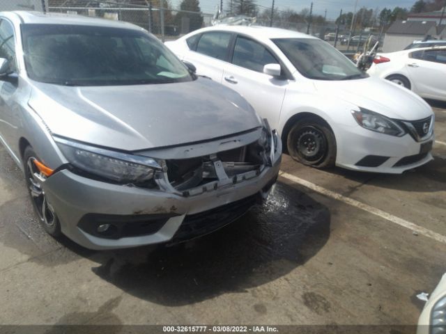 Photo 5 VIN: 19XFC1F93GE004929 - HONDA CIVIC SEDAN 