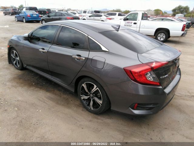 Photo 2 VIN: 19XFC1F93GE039793 - HONDA CIVIC SEDAN 