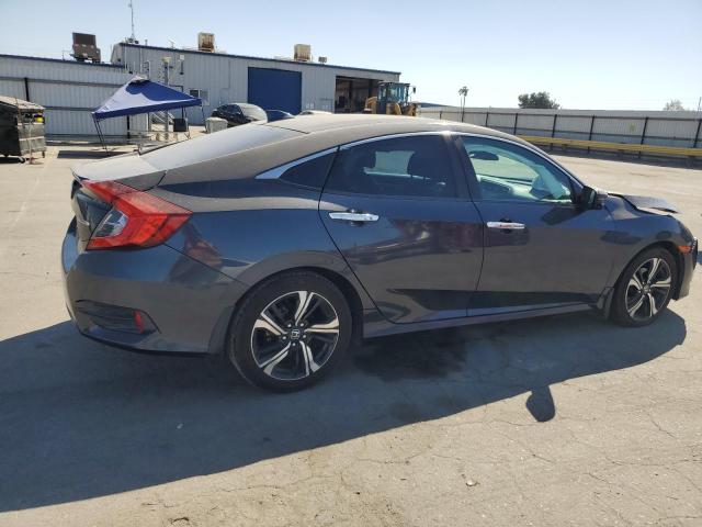 Photo 2 VIN: 19XFC1F94GE221163 - HONDA CIVIC TOUR 