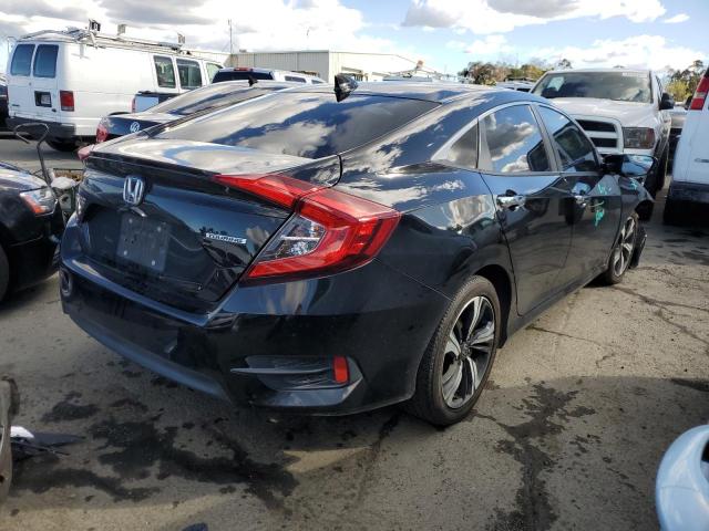 Photo 2 VIN: 19XFC1F95GE215680 - HONDA CIVIC TOUR 