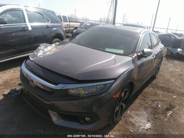 Photo 1 VIN: 19XFC1F97GE017957 - HONDA CIVIC SEDAN 