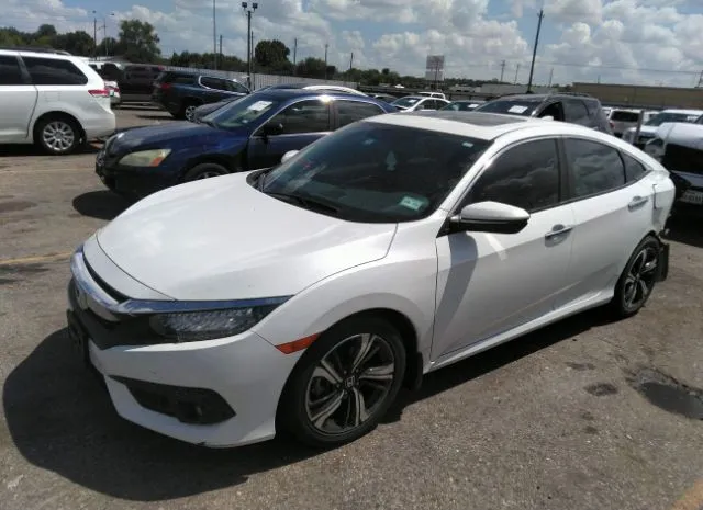 Photo 1 VIN: 19XFC1F9XGE037166 - HONDA CIVIC SEDAN 