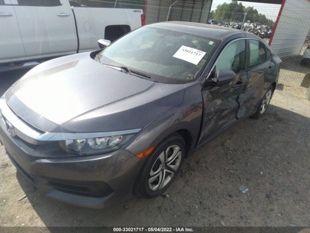 Photo 1 VIN: 19XFC2E50JE027340 - HONDA CIVIC SEDAN 