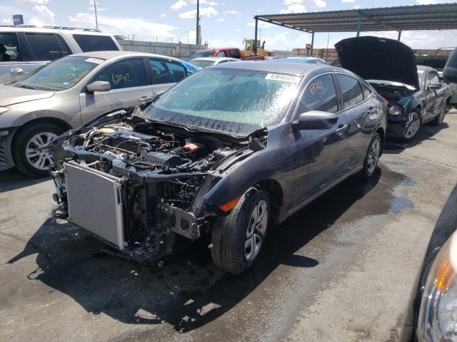 Photo 1 VIN: 19XFC2E54GE050290 - HONDA CIVIC LX 