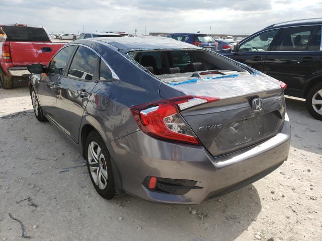 Photo 2 VIN: 19XFC2E56JE026922 - HONDA CIVIC LX 