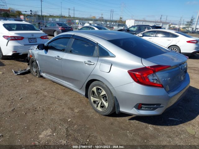 Photo 2 VIN: 19XFC2E57JE001401 - HONDA CIVIC SEDAN 