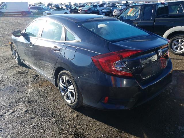 Photo 2 VIN: 19XFC2E5XHE058900 - HONDA CIVIC LX 