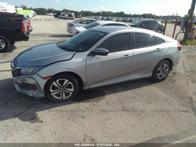 Photo 1 VIN: 19XFC2F50GE050057 - HONDA CIVIC SEDAN 