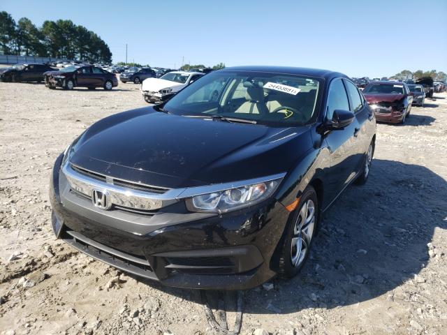 Photo 1 VIN: 19XFC2F50GE071135 - HONDA CIVIC LX 