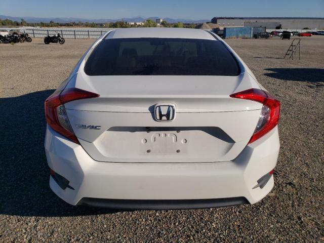 Photo 5 VIN: 19XFC2F50GE229523 - HONDA CIVIC LX 