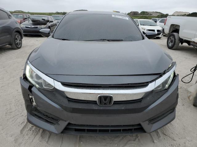 Photo 4 VIN: 19XFC2F50JE042001 - HONDA CIVIC LX 