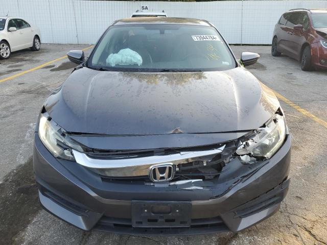 Photo 4 VIN: 19XFC2F51GE060418 - HONDA CIVIC LX 