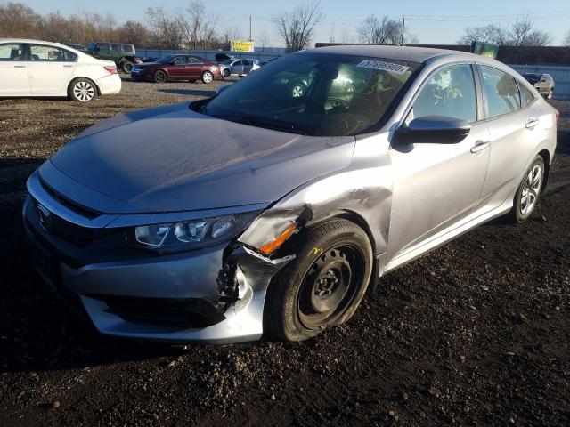 Photo 1 VIN: 19XFC2F51GE069104 - HONDA CIVIC LX 