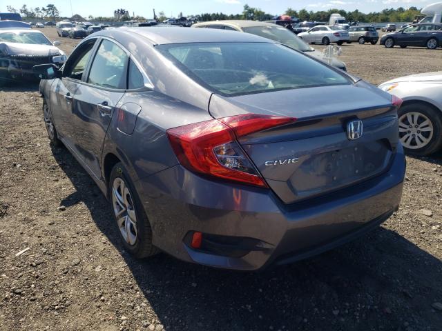 Photo 2 VIN: 19XFC2F51GE238635 - HONDA CIVIC LX 