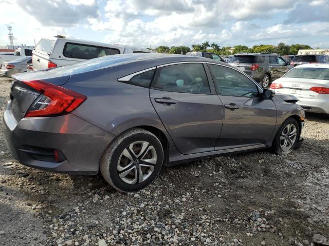 Photo 2 VIN: 19XFC2F52GE011616 - HONDA CIVIC LX 