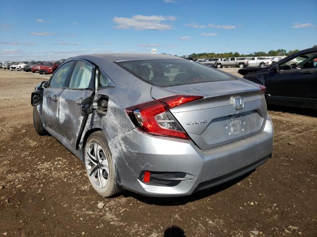 Photo 2 VIN: 19XFC2F52GE046088 - HONDA CIVIC LX 