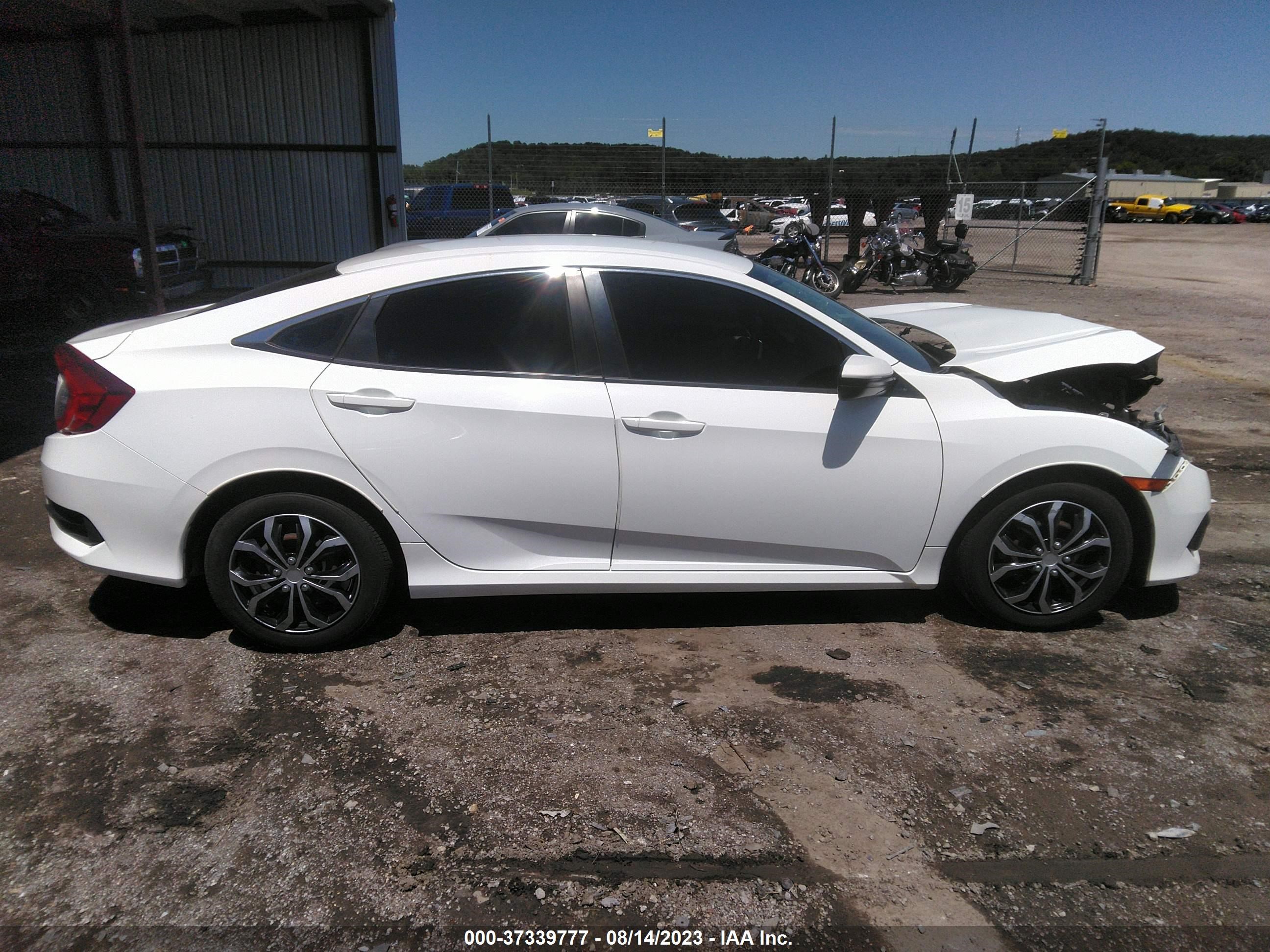 Photo 11 VIN: 19XFC2F52GE069046 - HONDA CIVIC 