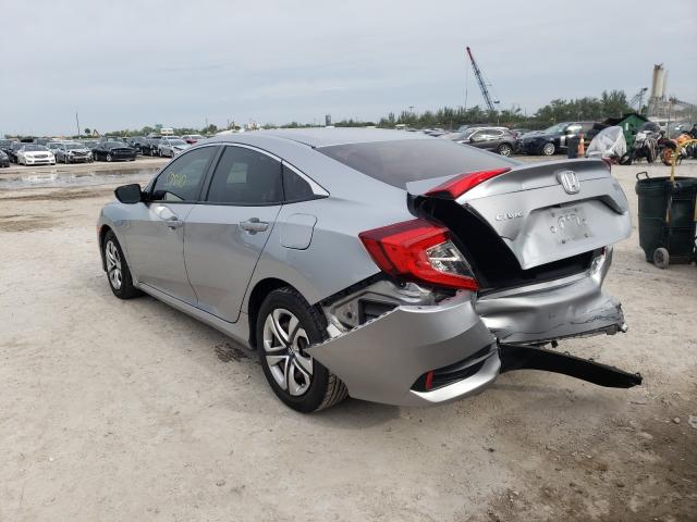 Photo 2 VIN: 19XFC2F52GE098823 - HONDA CIVIC LX 