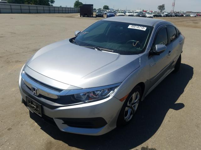 Photo 1 VIN: 19XFC2F52GE206650 - HONDA CIVIC LX 