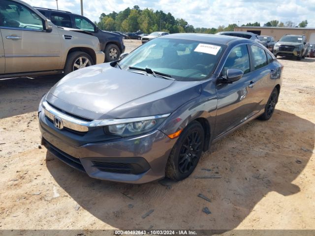 Photo 1 VIN: 19XFC2F52GE226588 - HONDA CIVIC 