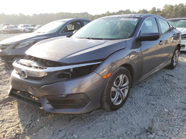 Photo 1 VIN: 19XFC2F52GE239311 - HONDA CIVIC LX 