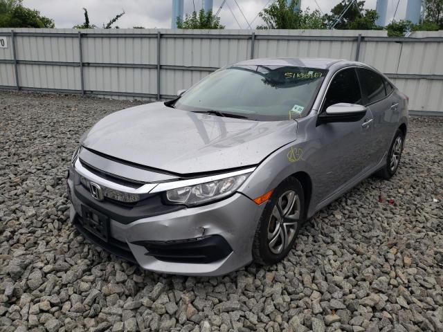 Photo 1 VIN: 19XFC2F52HE207587 - HONDA CIVIC LX 