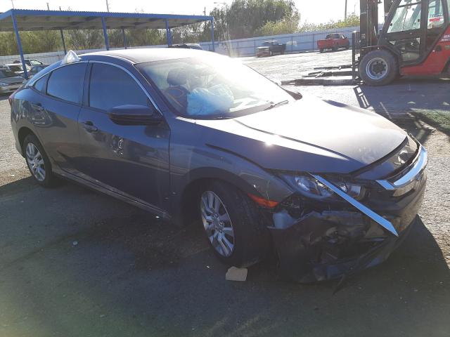 Photo 0 VIN: 19XFC2F52JE014099 - HONDA CIVIC LX 