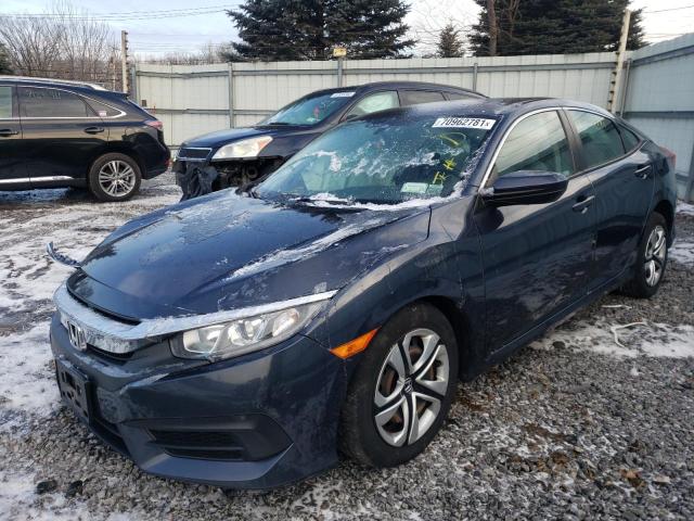 Photo 1 VIN: 19XFC2F52JE201861 - HONDA CIVIC LX 