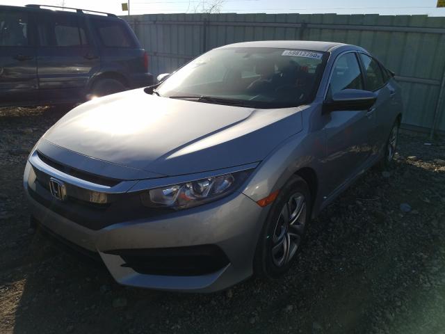 Photo 1 VIN: 19XFC2F53GE069380 - HONDA CIVIC LX 