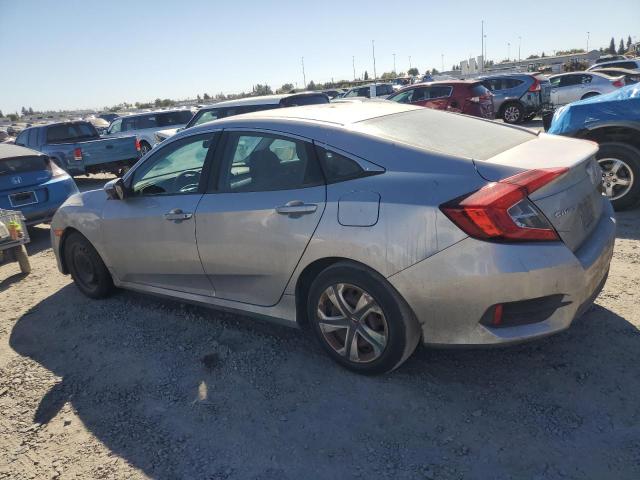 Photo 1 VIN: 19XFC2F53GE213137 - HONDA CIVIC LX 