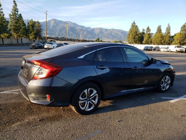 Photo 2 VIN: 19XFC2F53GE235669 - HONDA CIVIC 