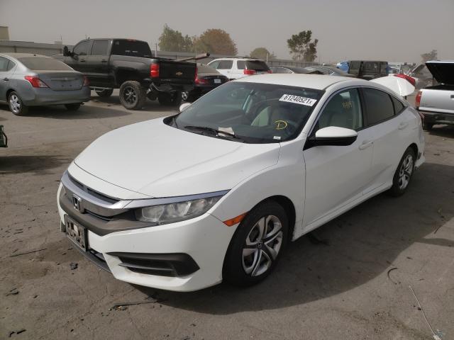 Photo 1 VIN: 19XFC2F53GE242900 - HONDA CIVIC LX 