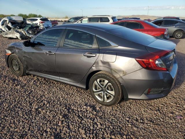 Photo 1 VIN: 19XFC2F53HE023677 - HONDA CIVIC LX 