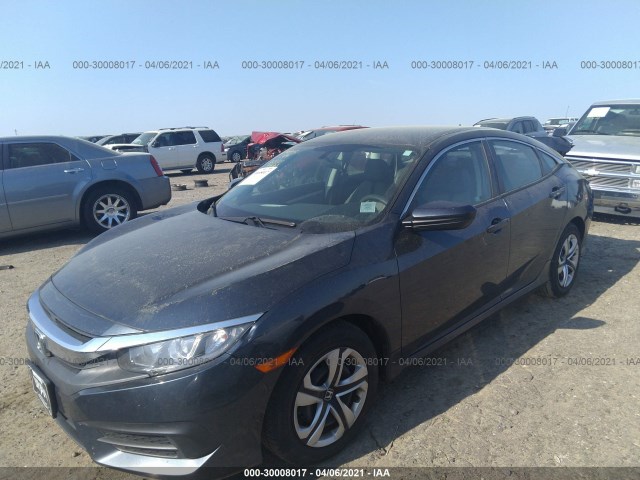 Photo 1 VIN: 19XFC2F53HE048126 - HONDA CIVIC SEDAN 