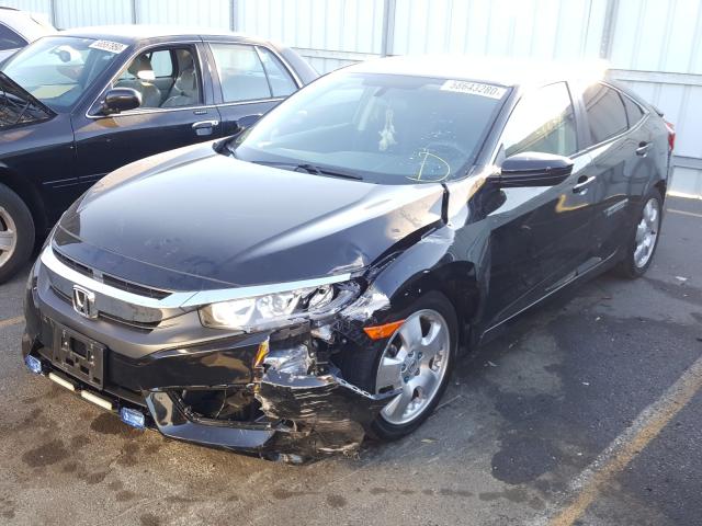 Photo 1 VIN: 19XFC2F53HE209994 - HONDA CIVIC LX 