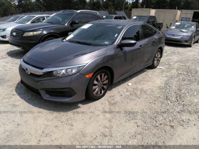 Photo 1 VIN: 19XFC2F54GE004473 - HONDA CIVIC SEDAN 