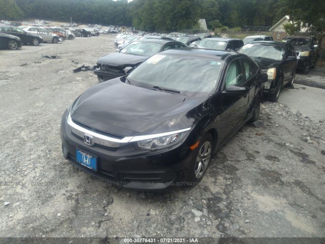 Photo 1 VIN: 19XFC2F54GE004554 - HONDA CIVIC SEDAN 