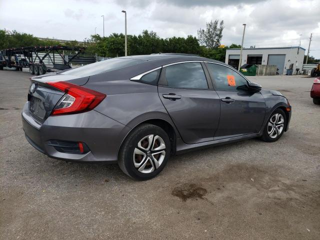 Photo 2 VIN: 19XFC2F54GE025517 - HONDA CIVIC LX 