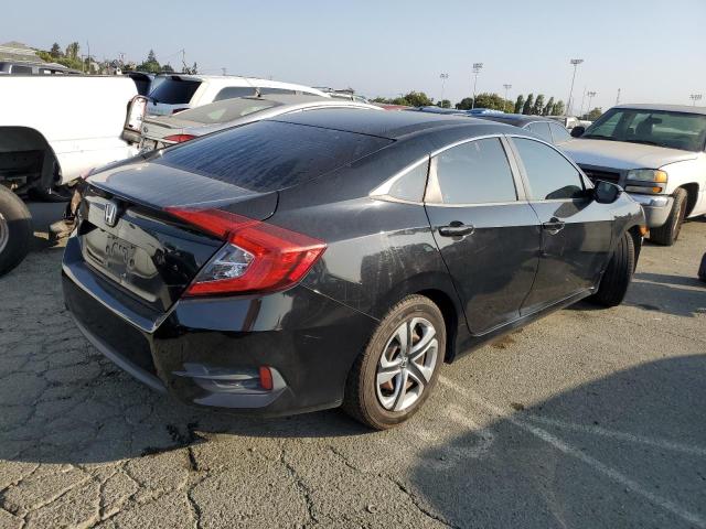 Photo 2 VIN: 19XFC2F54GE229394 - HONDA CIVIC LX 