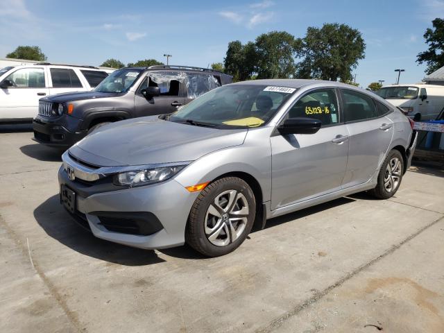 Photo 1 VIN: 19XFC2F54GE230917 - HONDA CIVIC LX 