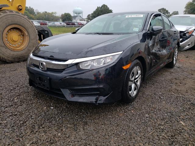 Photo 1 VIN: 19XFC2F54GE245014 - HONDA CIVIC LX 