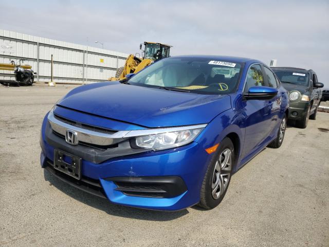 Photo 1 VIN: 19XFC2F54HE056431 - HONDA CIVIC LX 