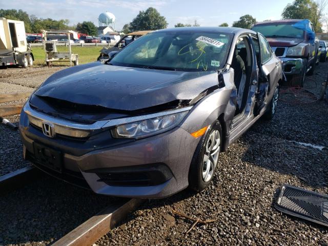 Photo 1 VIN: 19XFC2F54HE233592 - HONDA CIVIC LX 