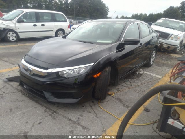 Photo 1 VIN: 19XFC2F54JE000379 - HONDA CIVIC LX 