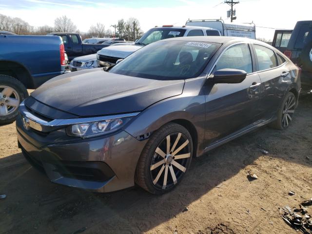 Photo 1 VIN: 19XFC2F55GE046134 - HONDA CIVIC LX 