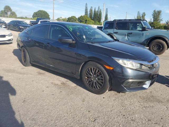 Photo 3 VIN: 19XFC2F55GE079585 - HONDA CIVIC LX 