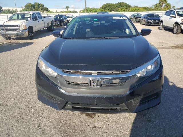 Photo 4 VIN: 19XFC2F55GE079585 - HONDA CIVIC LX 