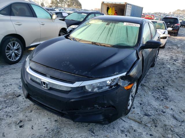 Photo 1 VIN: 19XFC2F55GE099254 - HONDA CIVIC LX 